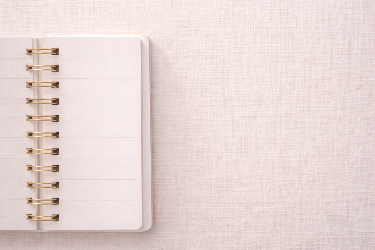 Notebook and ribbon representing deliberate planning